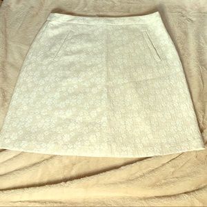 Cream and white quilted skirt with pockets